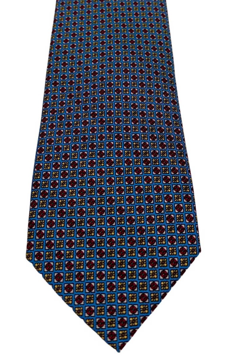 Cravatta uomo celeste fantasia in pura seta cucita a mano costruzione 3 piege larghezza 9cm