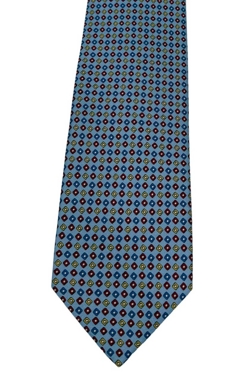 Cravatta uomo celeste fantasia in pura seta cucita a mano costruzione 3 piege larghezza 9cm