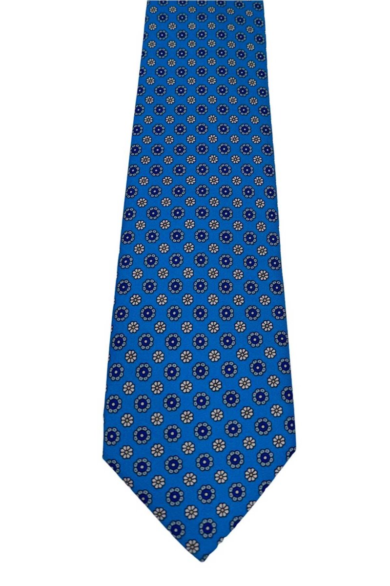 Cravatta uomo celeste fantasia in pura seta cucita a mano costruzione 3 piege larghezza 9cm