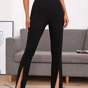 Pantaloni in tinta unita con orlo a fessura