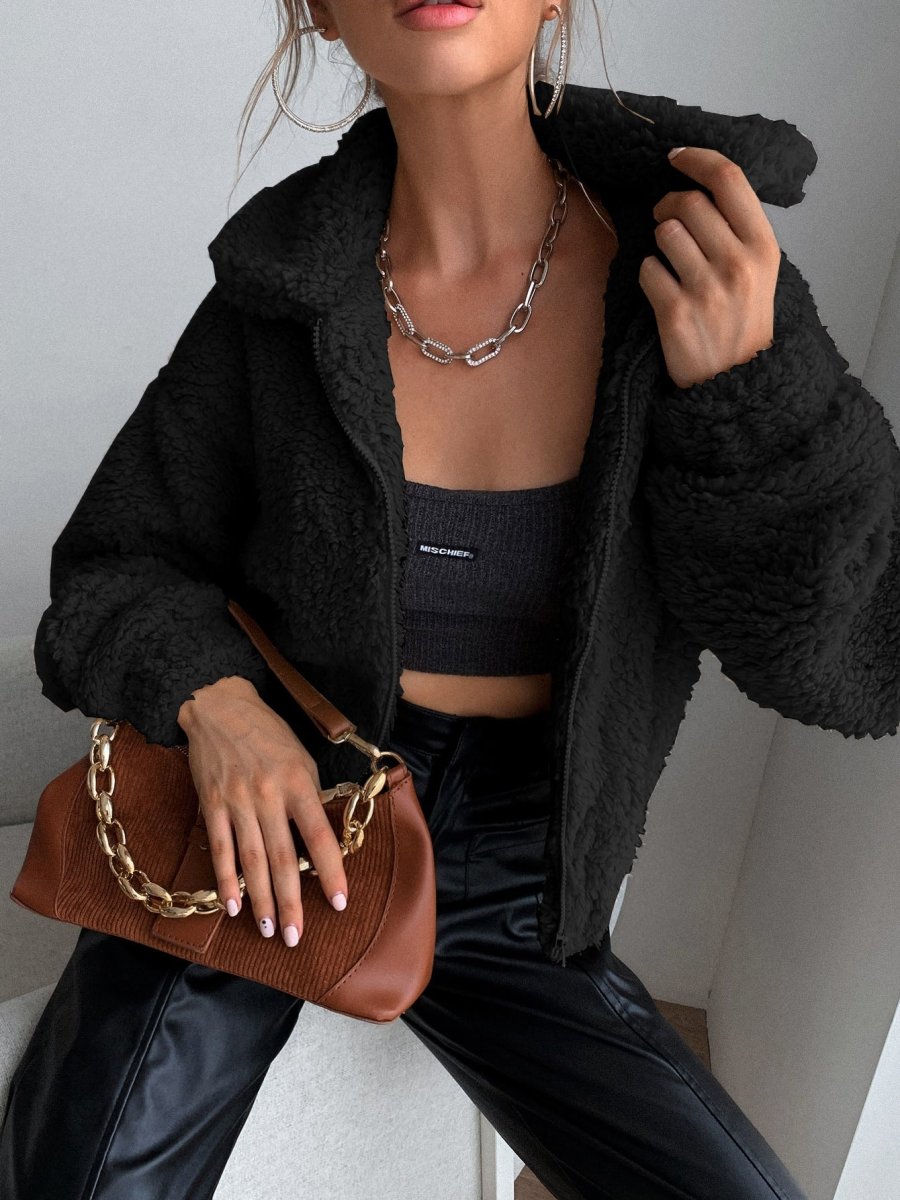 Giacca in pile con zip e spalla a goccia