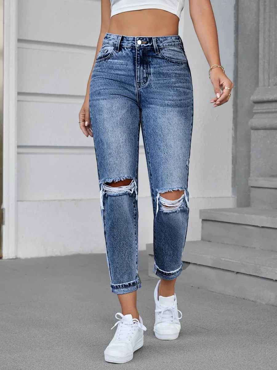 Jeans vita alta con strappi - immagine 7