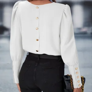 Camicetta monocolore con bottone indietro