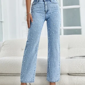 Jeans a gamba svasata dettaglio di perle