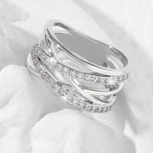 Anello fascia zirconi incrociato