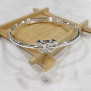 Bracciale rigido doppio cuore con strass in acciaio inossidabile