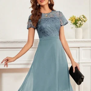 Abito trapezio pizzo a contrasto