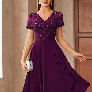 Abito da cocktail a balze inserto paillettes e chiffon