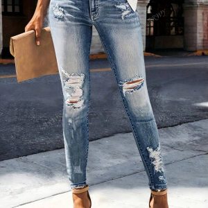 Jeans skinny  denim lavato con strappi