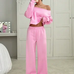 Set Sport con maglia a collo barca pantaloni larghi