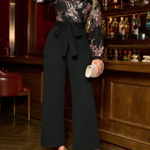 Tuta decorazione pailliettes e cinta