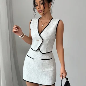 Completo tweed top smanicato con bordi a contrasto