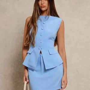 Completo top smanicato e minigonna