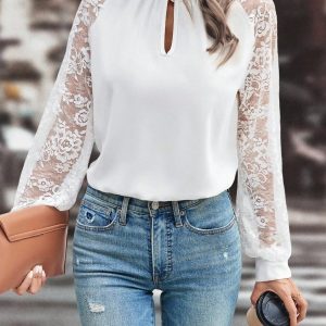 Blusa collo alla coreana, maniche raglan e pizzo