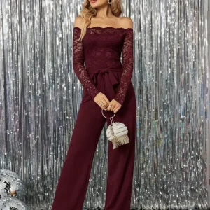 Jumpsuit spalle scoperte corpetto pizzo e cintura